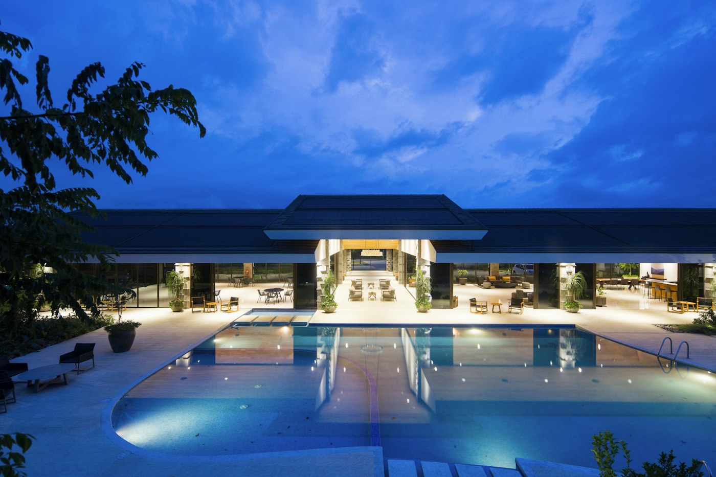 Corinthia luxury hotel facade at dusk